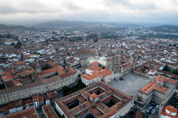 Fototapeta na wymiar Aerial drone view of the Praza de Obraidoro in Santiago de Compostela, the monumental center of the Galicia community in Spain.