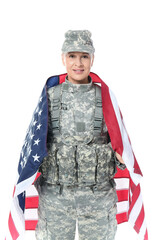 Mature female soldier with USA flag on white background