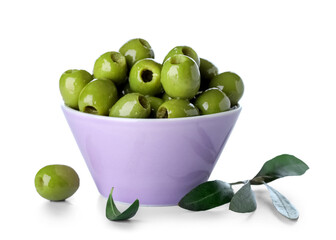 Bowl full of delicious green olives on white background