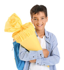 Little boy with yellow school cone on white background