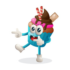 Cute cupcake mascot playful with pointed hand
