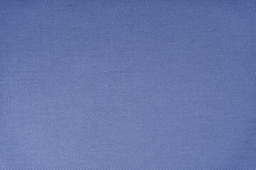 Texture of natural blue fabric or cloth. Fabric texture diagonal weave of natural cotton or linen textile material. Blue canvas background. Decorative fabric, curtain, furniture, walls, clothes