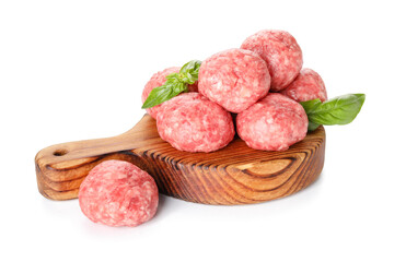 Cutting board with raw meat balls and basil on white background