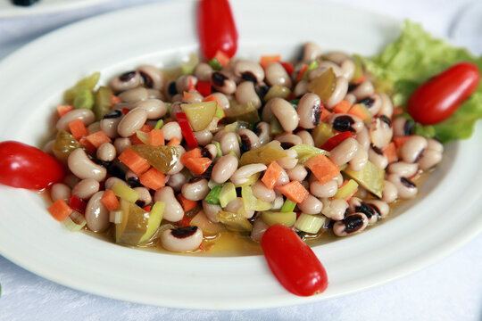 Turkish appetizer food 'Kidney Bean' (Turkish: Borulce) on the dinner plate.