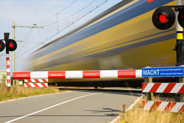 Den Helder, Netherlands. August 2022. Long exposure shoot of passing train. - obrazy, fototapety, plakaty