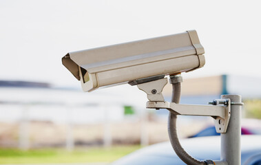 Old CCTV camera security at outdoor parking, close up