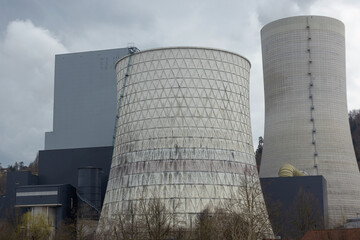 Thermal power plant cooling tower releasing smoke and co2 rich emissions polluting the air