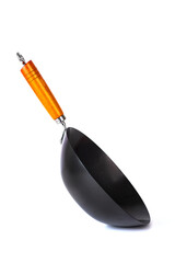 big black wok for cooking with wooden handle on white