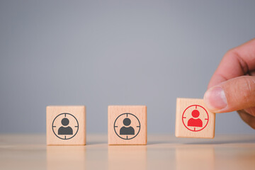 Hand holds wood cubes stacking with person data, Customer psychology profile or characteristics,...