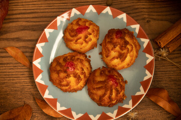 Traditional coconut dessert of the autumn and Christmas season, known as coconut bites, coconut candy, baked coconut and mini coconut sighs