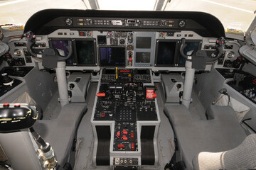 Modern turboprop airplane cockpit detail interior view