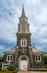 Fototapeta na wymiar Schenectady, NY - USA - Aug 5, 2022 a Vertical view of St. George's Episcopal Church, located in the heart of the Historic Stockade district of Schenectady, New York. Founded in 1735.