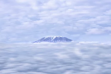 Papier Peint photo autocollant Kilimandjaro Mount Kilimanjaro peak over rainy cloud  in Tanzania view from Amboseli National Park Kenya