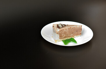 Plate with a piece of cheesecake 