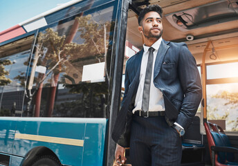 Corporate businessman travel in a city on a bus to work in a suit thinking of goals and...