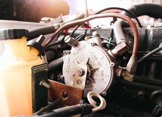 LPG pressure reducer for sequential injection systems of Liquefied Petroleum Gas alternative fuel system in a car.