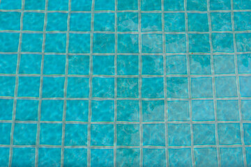 ripple surface water in blue swimming pool