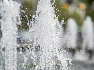 Splashes of water against light background.