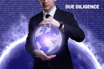 Business, Technology, Internet and network concept. Young businessman working on a virtual screen of the future and sees the inscription: Due diligence