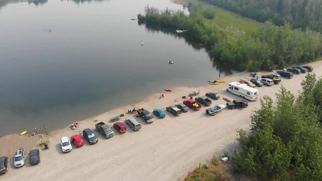 4K Drone Video of Paddle Boarders and Kayakers on Cushman Lake in Fairbanks, AK during Summer Day