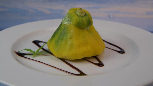 Recipe for mini patissons stuffed with mozarella, basil, tomato and balsamic vinegar on turntable, High quality photo