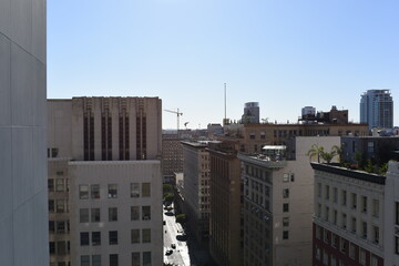 Fototapeta na wymiar Aerial City Urban Buildings Skyline Daytime Clear city streets below