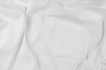 White fabric. luxurious white fabric texture background. Creases of satin, silk, and cotton.	