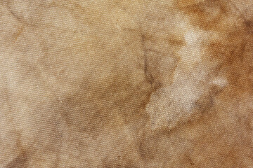 Old fabric with brown stains full frame for background, murder case idea, old blood stains on fabric,cream brown abstract