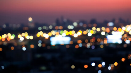 Blurred and  bokeh city aerial view from the rooftop view point image in the night