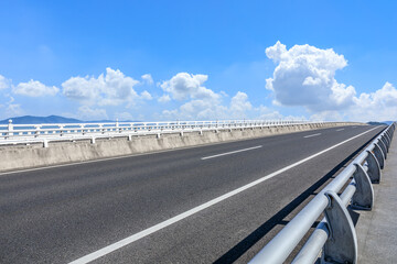 Empty asphalt road and sky cloud background