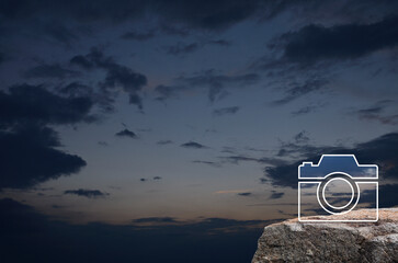 Camera flat icon on rock mountain over sunset sky, Business camera service concept