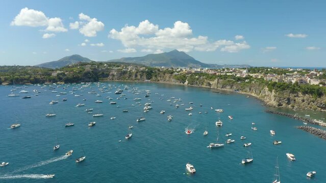 Beautiful Aerial View of Boats Anchored off an Island in the Mediterranean Sea. Procida, Italy