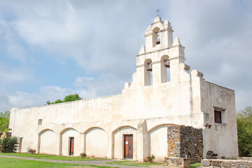 Historic Spanish architecture building San Antonio Texas Mission San Juan on a cloudy day	