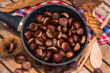 natural chestnuts in the pan ready to cook