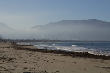 evocative image of a sandy beach in Sicily in summer under a beautiful blue sky 
