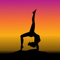 silhouette of a woman in yoga pose