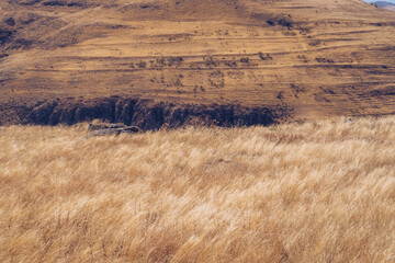 Picturesque autumn field landscape. Fields and meadows in the mountains of Armenia region. Stock...