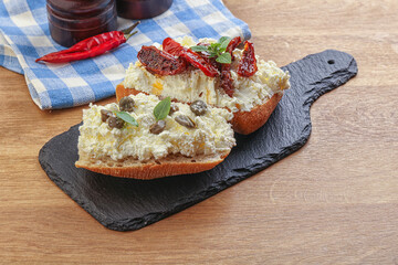 bruschetta with soft cheese capers and tomato