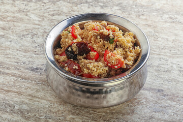 Arabic cous cous with meat and tomato