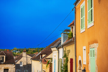 Fototapeta na wymiar Dourdan, FRANCE - August 14, 2022: Street view of old village Dourdan in France