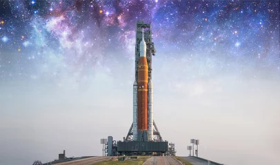 Peel and stick wall murals Nasa Spaceship on launch pad. Mission to Moon. Return to Moon. SLS space rocket. Orion spacecraft. Aretmis spae program to research solar system. Elements of this image furnished by NASA