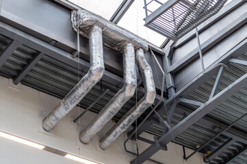 pipes on the roof of an industrial building