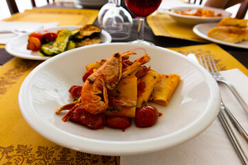 Cannelloni with red shrimp sauce and wine, Rimini, Italy