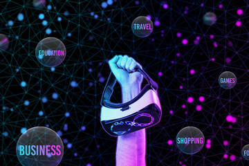 A male hand holds VR glasses with symbol of metaverse. Black background with neon abstract grid and spheres of interest. The concept of choice, cyberspace and virtual reality