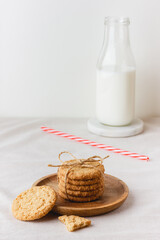 Oatmeal cookies on a wooden plate
