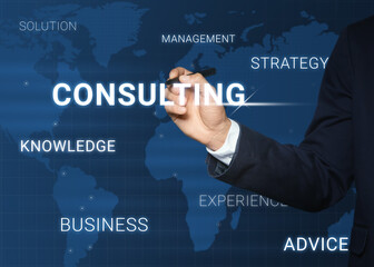 Man pointing at word CONSULTING on virtual screen, closeup