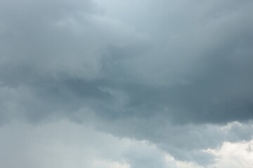 Naklejka na ściany i meble Sky with heavy rainy clouds. Stormy weather