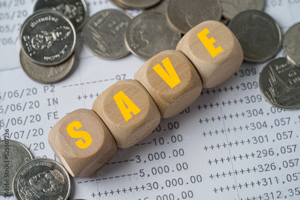 Poster save wording print screen on wooden cube block with deposit book bank and coins , money saving for i