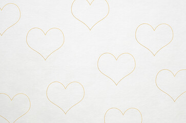 Japanese washi paper background with gold heart pattern. White handmade paper texture with gold heart pattern.