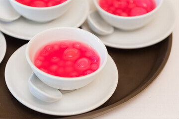 Bua Loi dessert, red beads, distributed at the wedding